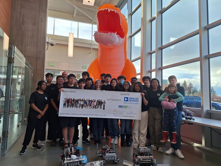 A group photo of the Mukilteo Robotics Club members at the 2023-2024 VEX Robotics Competition Washington State Championship.